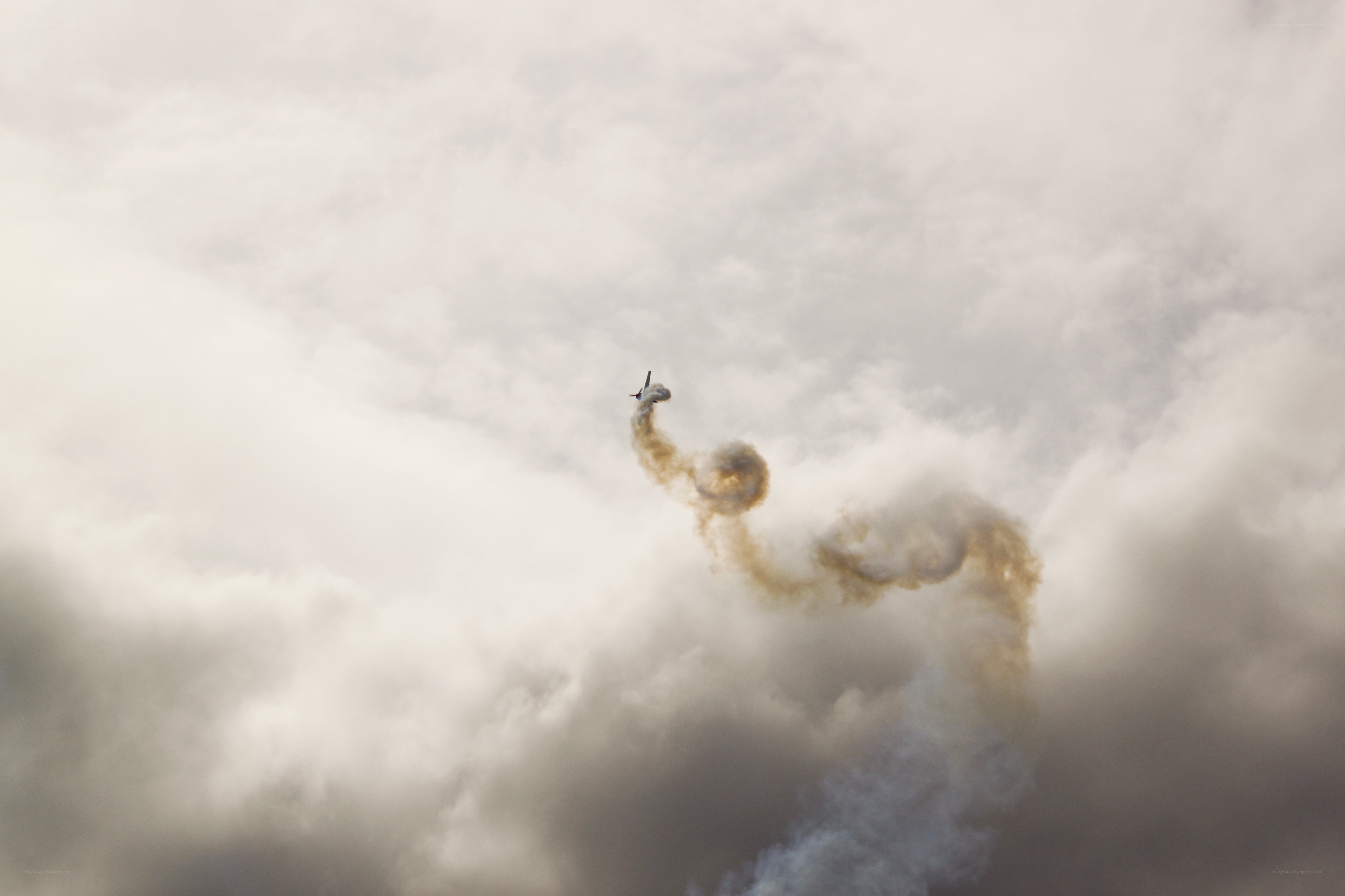 Jet performing aerobatic maneuver