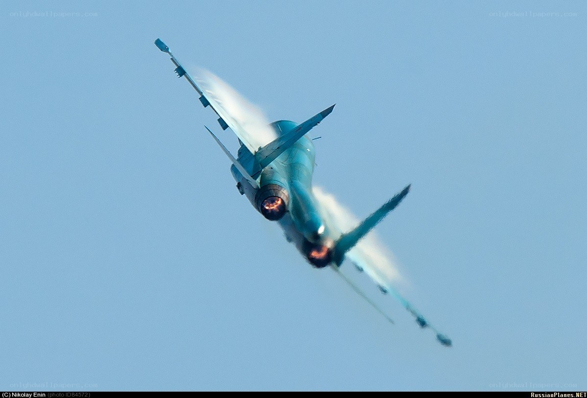 jet performing aerobatic maneuver