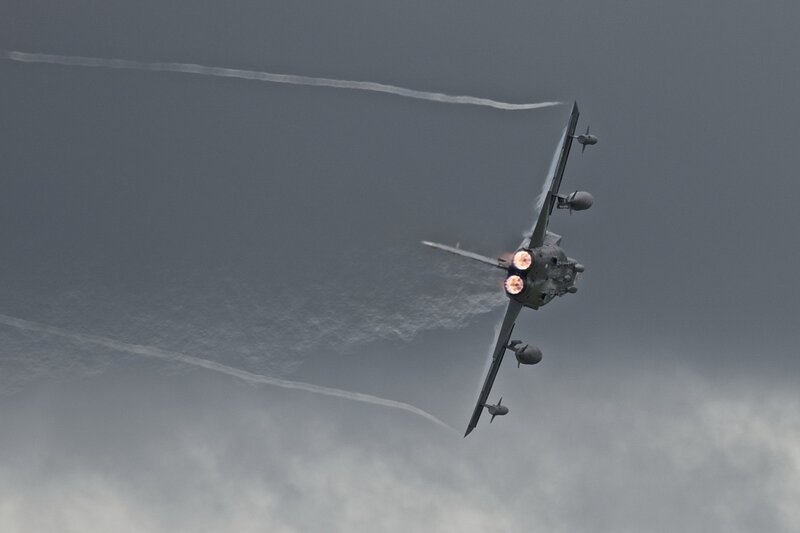 Jet performing aerobatic maneuver