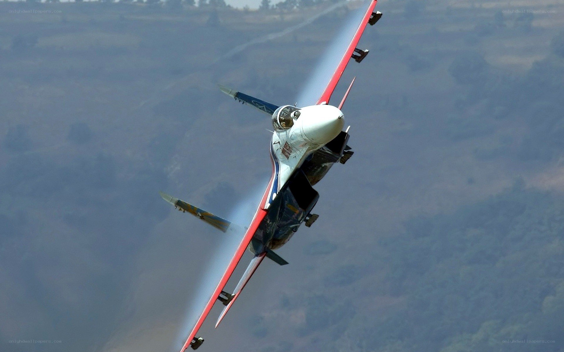 jet performing aerobatic maneuver