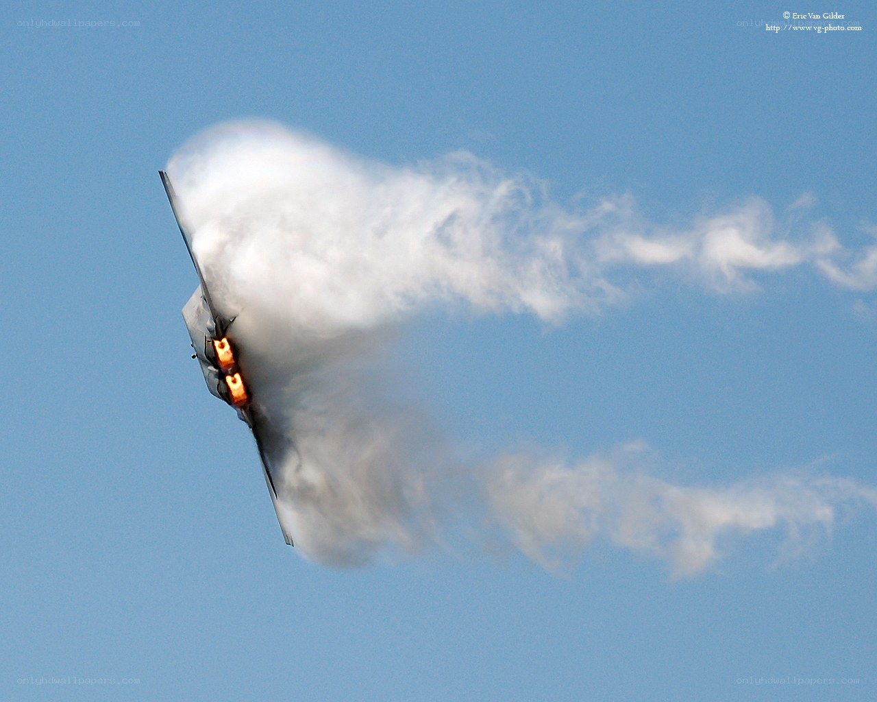 Jet performing aerobatic maneuver