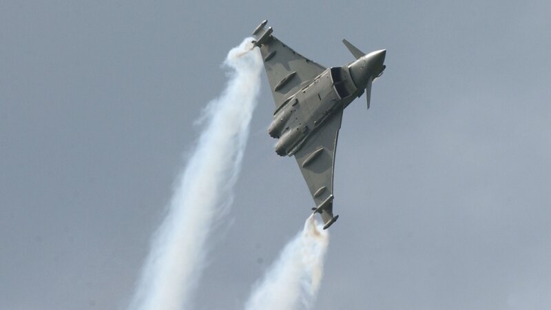 jet performing aerobatic maneuver
