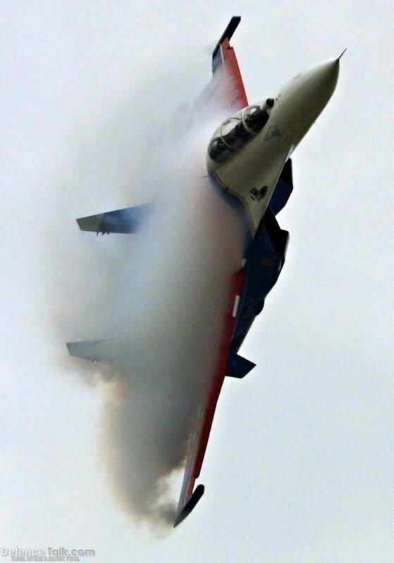 jet performing aerobatic maneuver