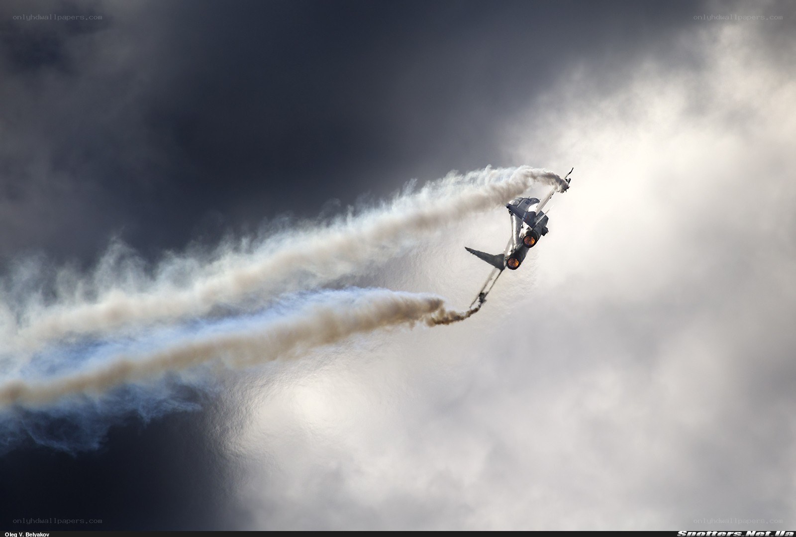 Jet performing aerobatic maneuver