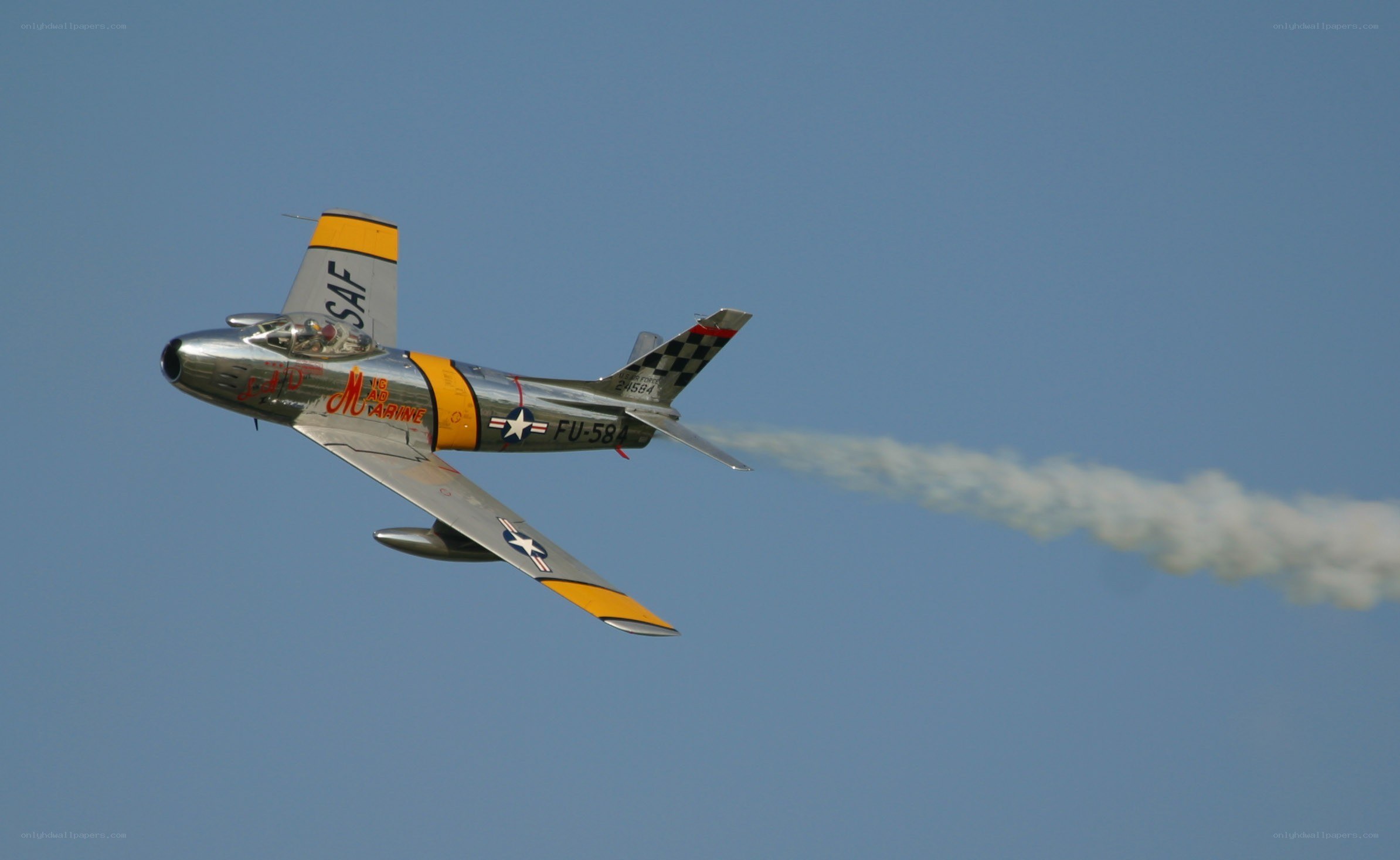 Jet performing aerobatic maneuver