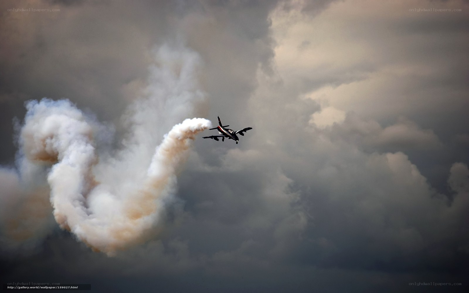 Jet performing aerobatic maneuver