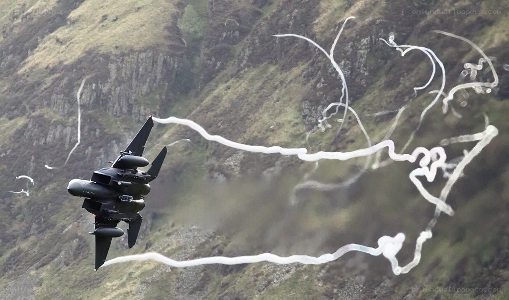 Jet performing aerobatic maneuvers