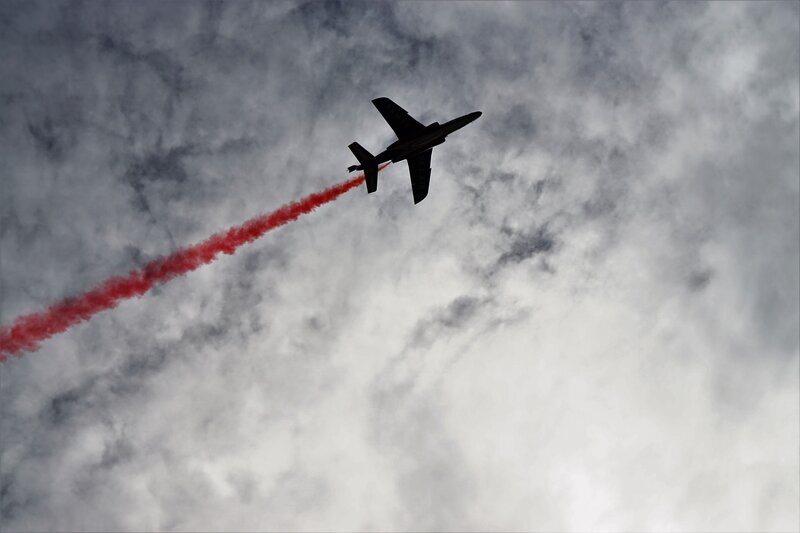 Jet Plane with Red Smoke