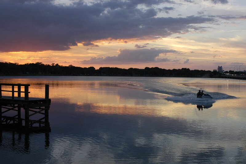 Jet ski at sunset on a lake