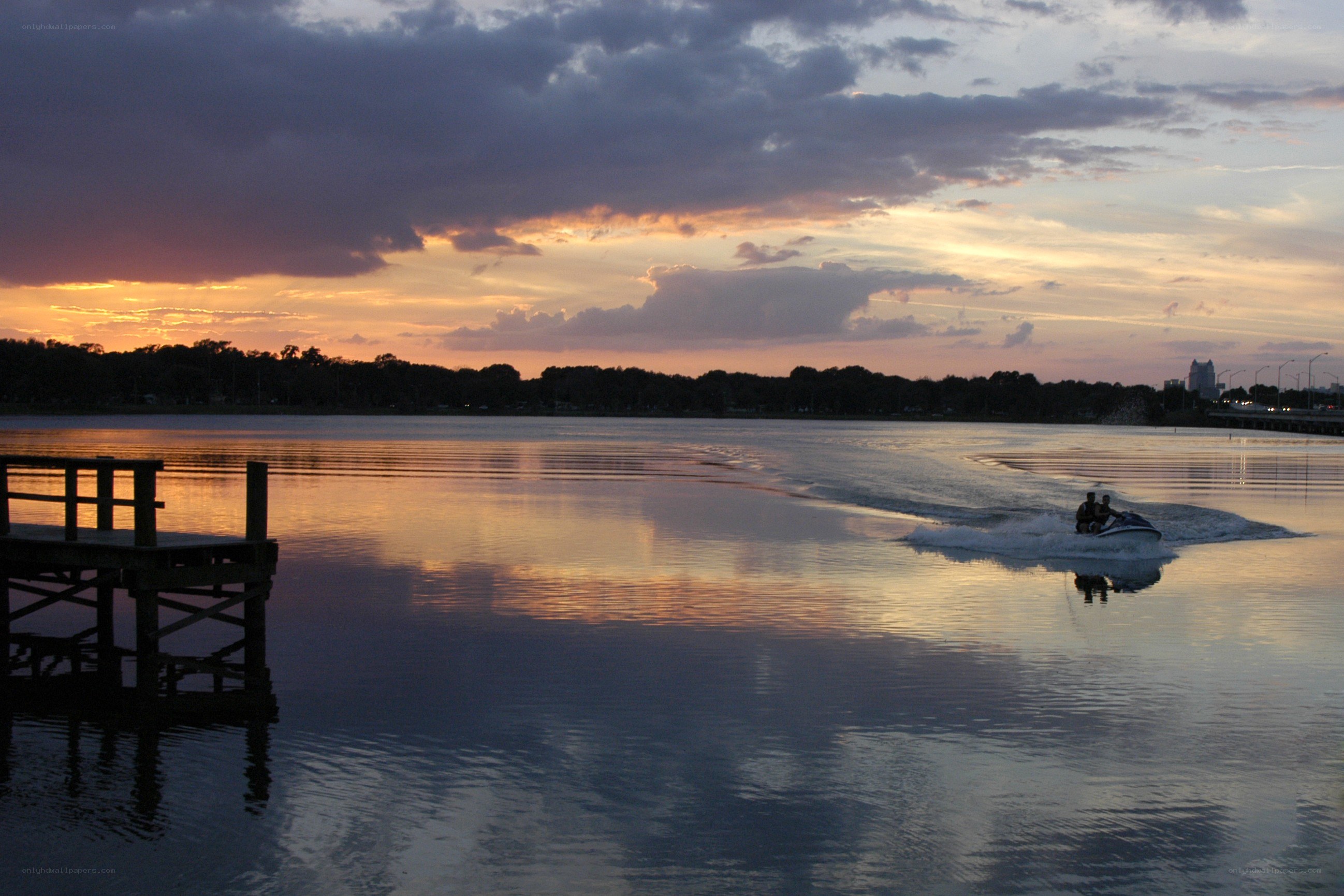 Jet ski at sunset on a lake