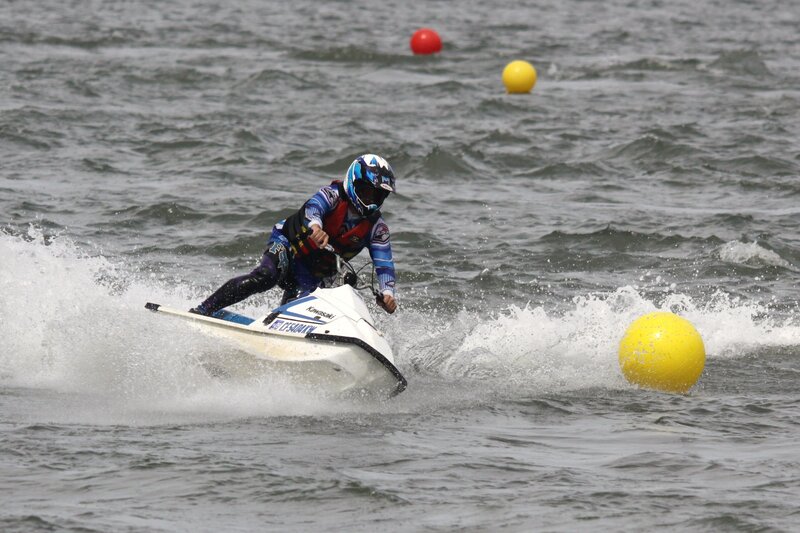Jet ski racer navigating course