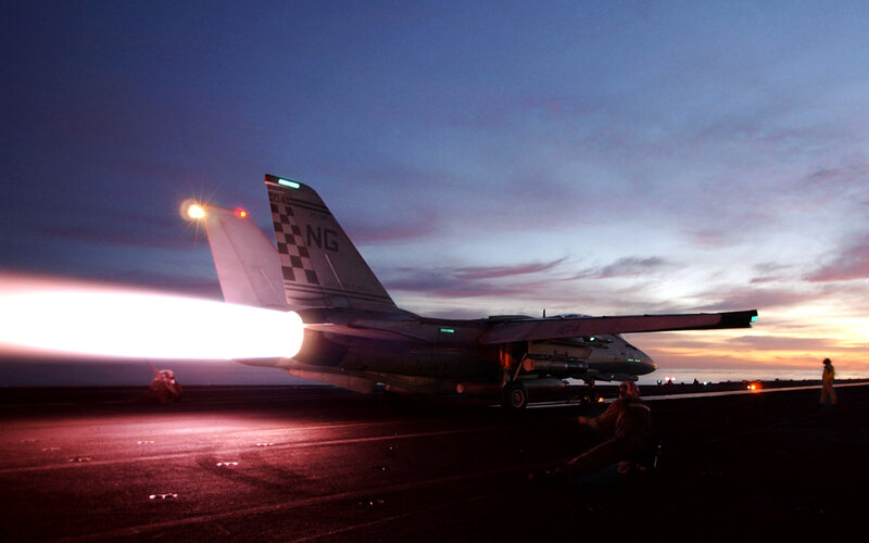Jet taking off at dusk