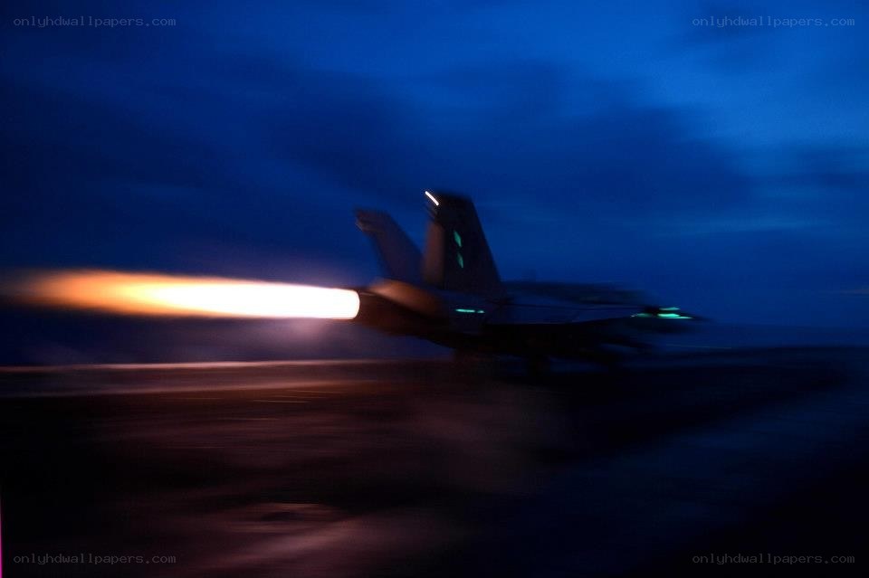 Jet taking off at night