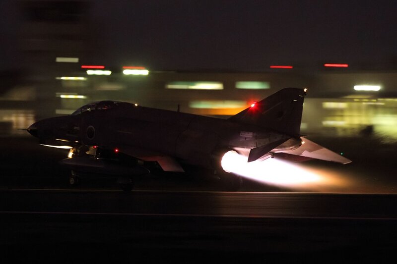Jet taking off at night
