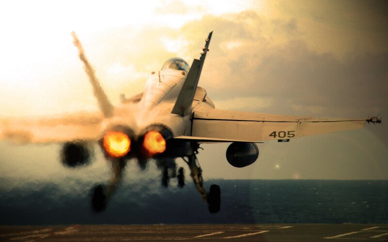 Jet taking off from aircraft carrier