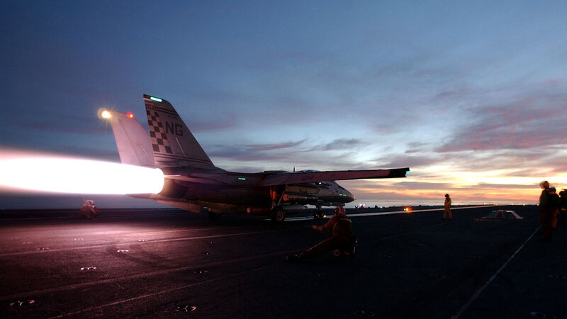 Jet taking off from aircraft carrier