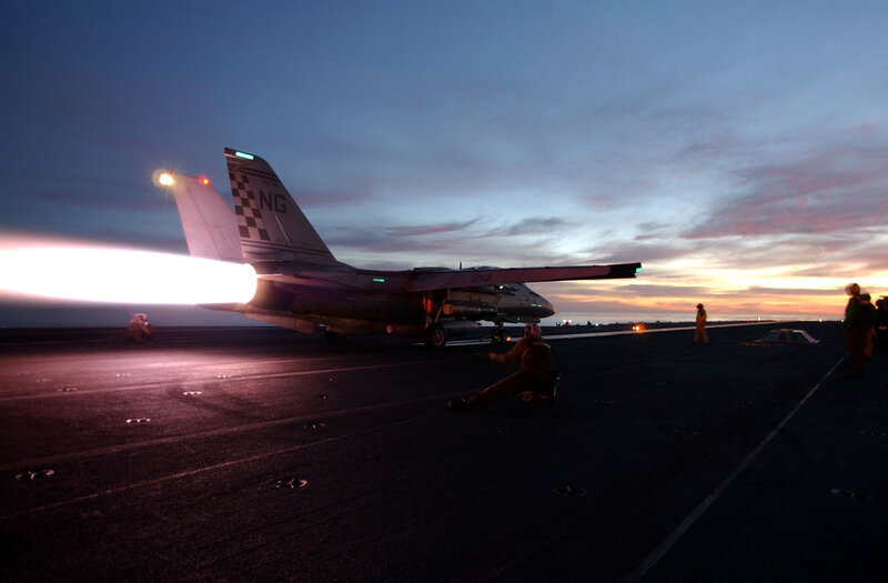 Jet taking off from aircraft carrier