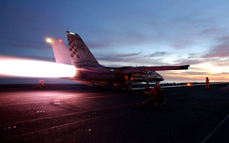 Jet taking off from aircraft carrier
