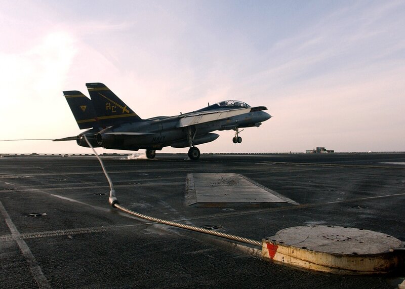 Jet taking off from aircraft carrier