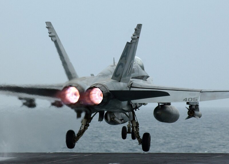 Jet taking off from aircraft carrier