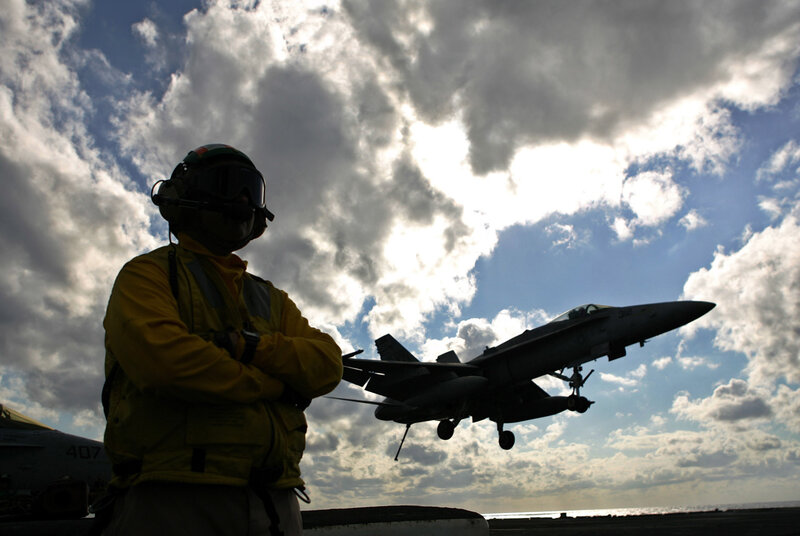 Jet taking off from aircraft carrier
