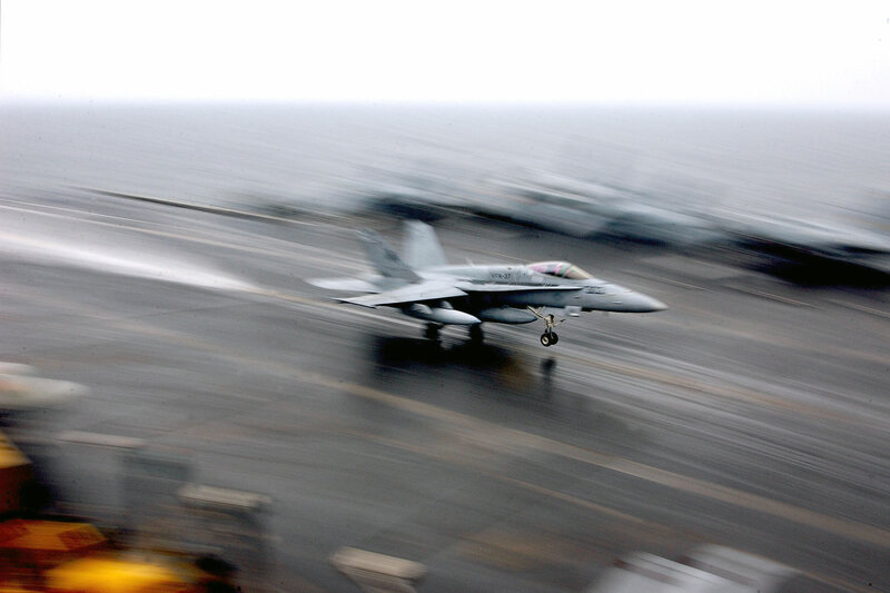 Jet taking off from aircraft carrier