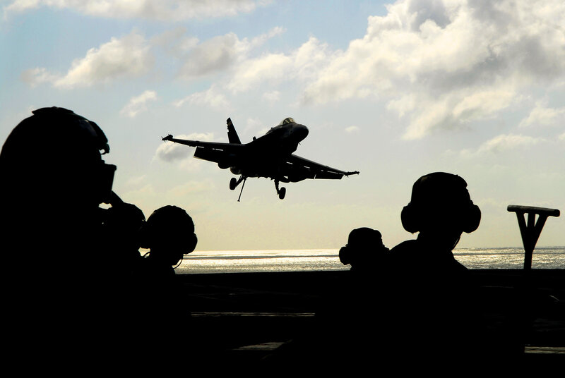 Jet taking off from aircraft carrier