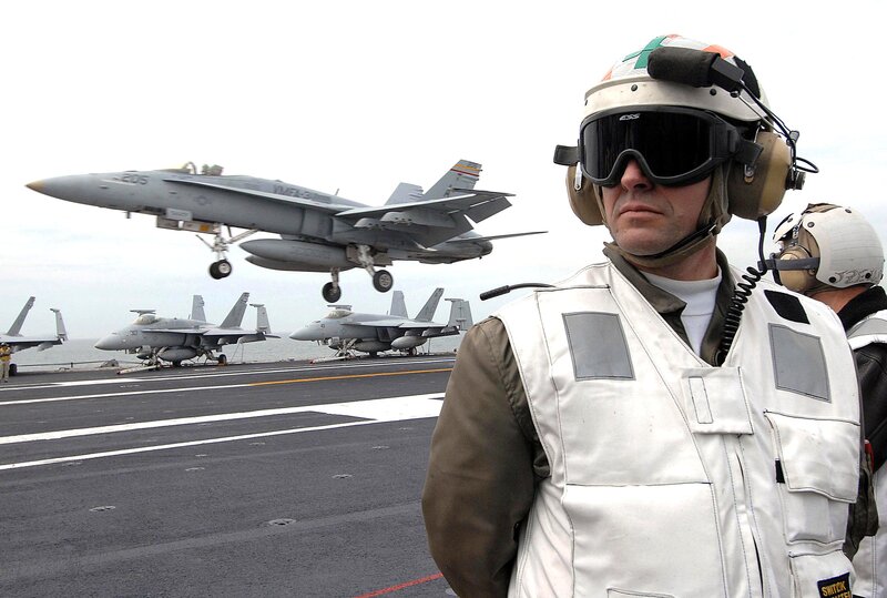Jet taking off from aircraft carrier