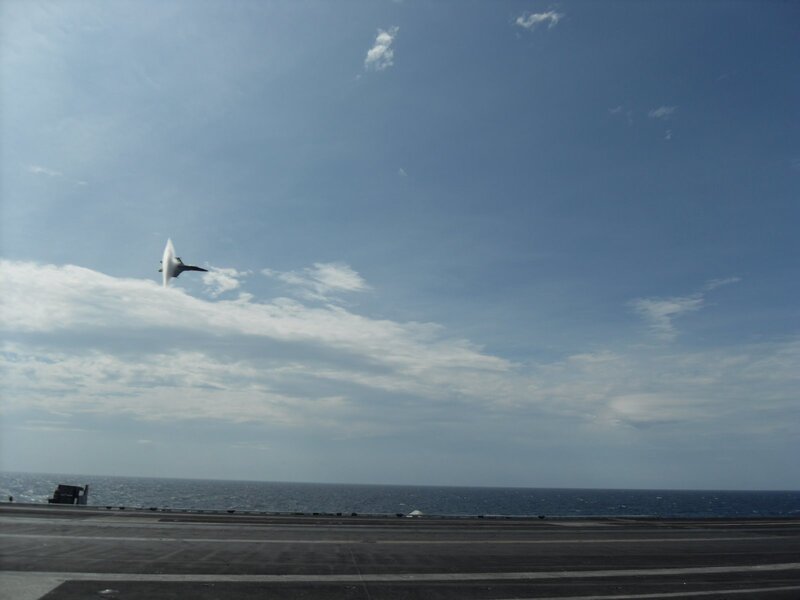 Jet taking off from aircraft carrier