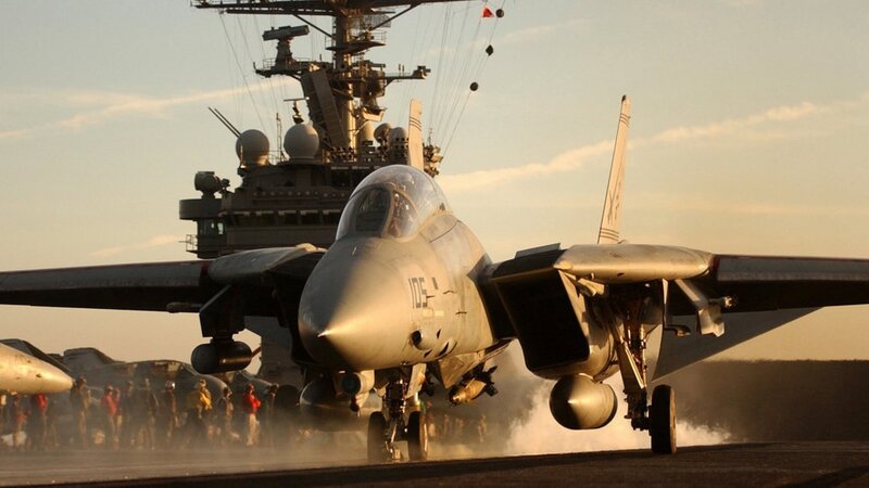 Jet taking off from aircraft carrier