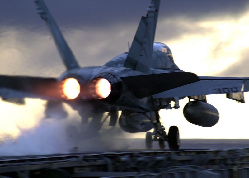 Jet taking off from aircraft carrier
