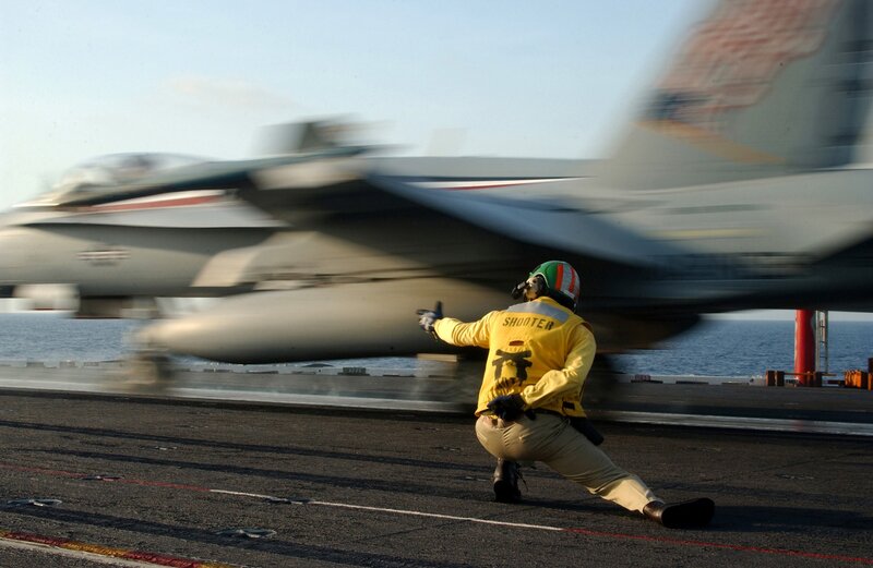 Jet taking off from aircraft carrier