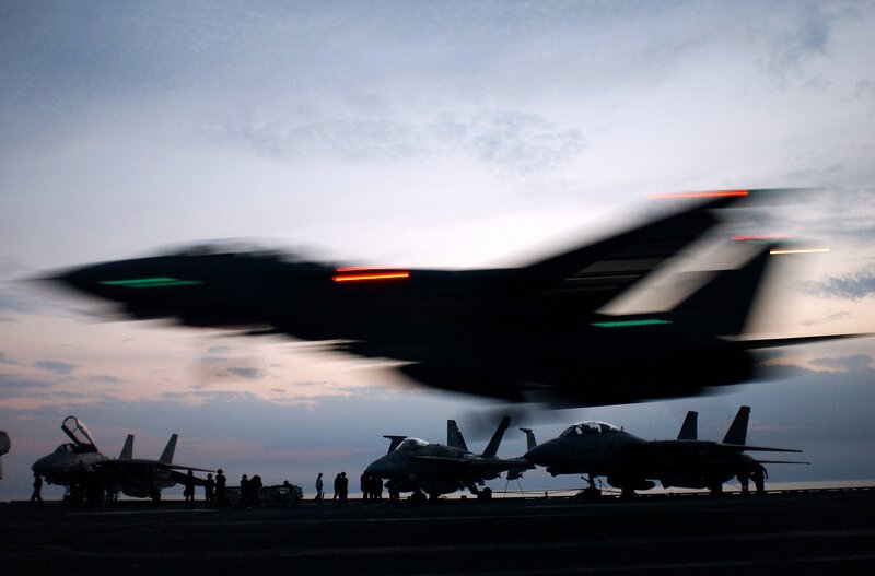 Jet taking off from aircraft carrier