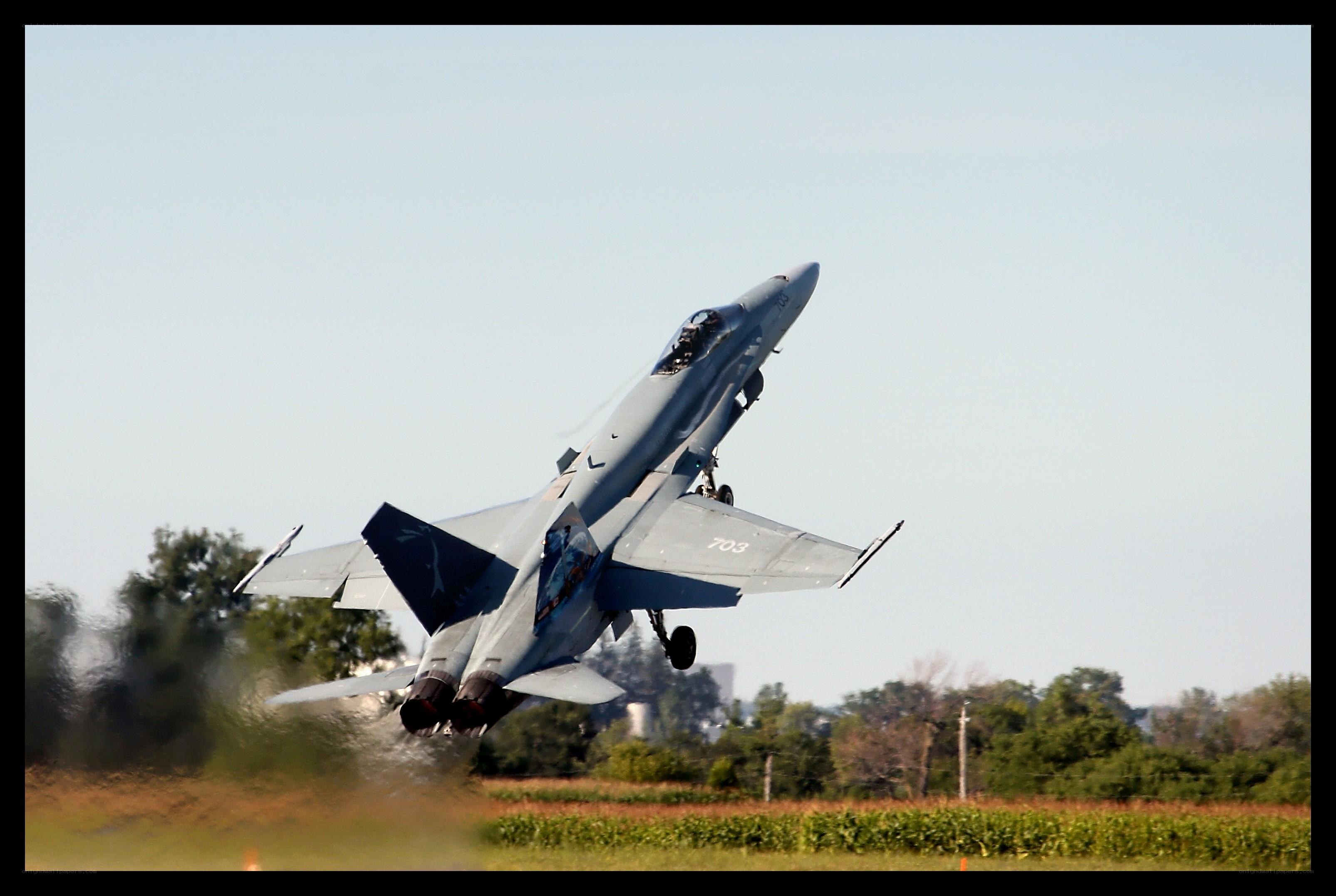 jet taking off from runway
