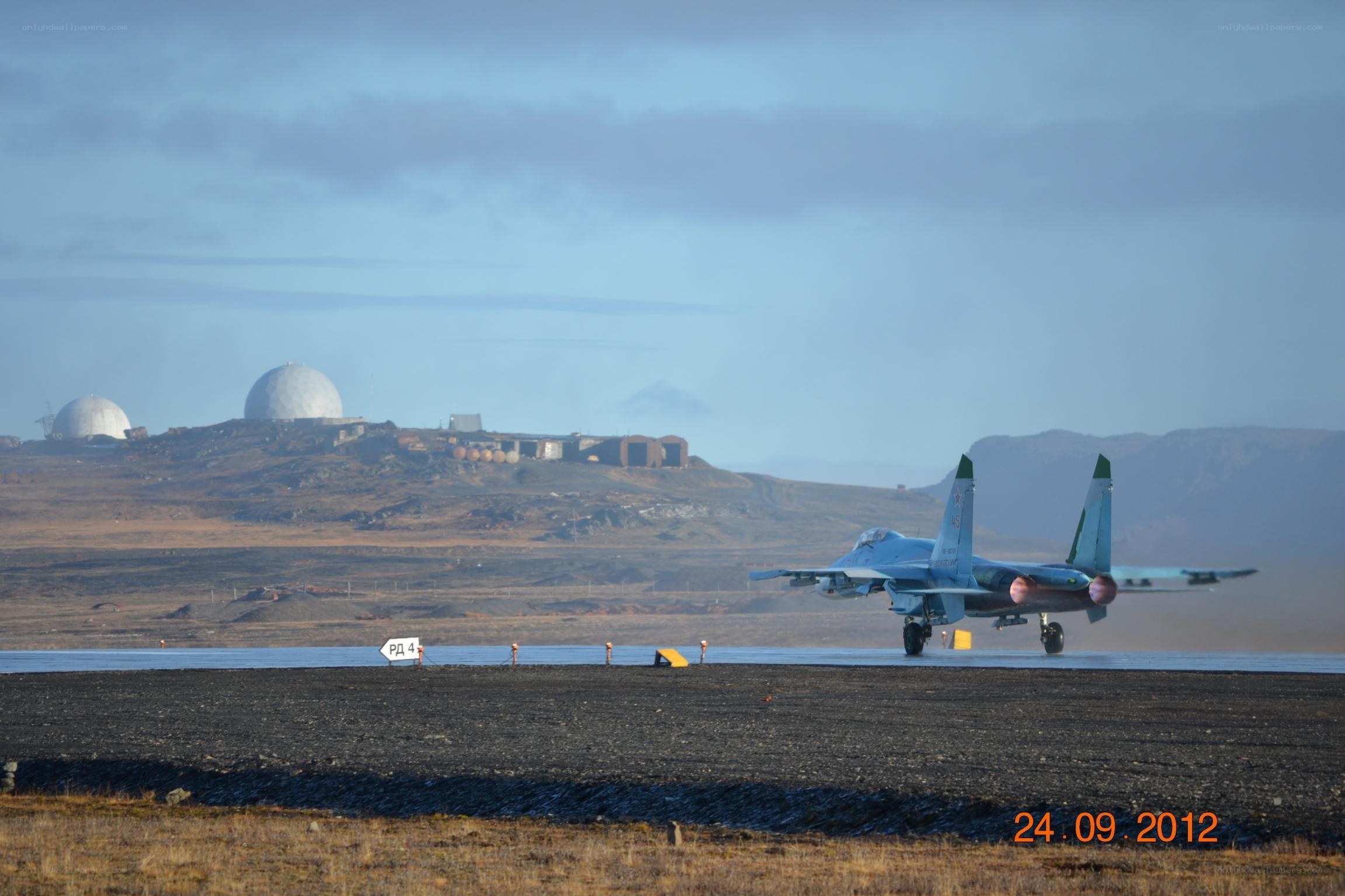 Jet taking off from runway