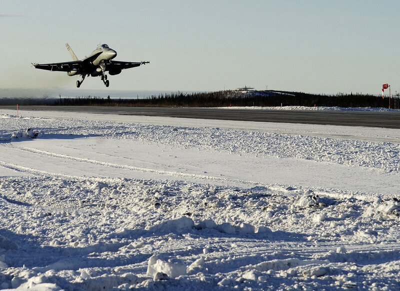 Jet taking off in snowy weather
