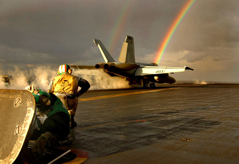 Jet taking off on aircraft carrier