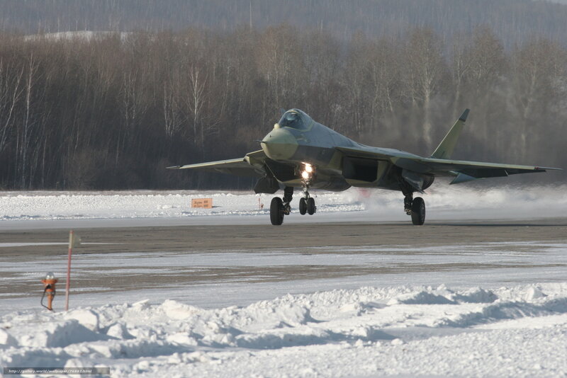 Jet taking off on snowy runway