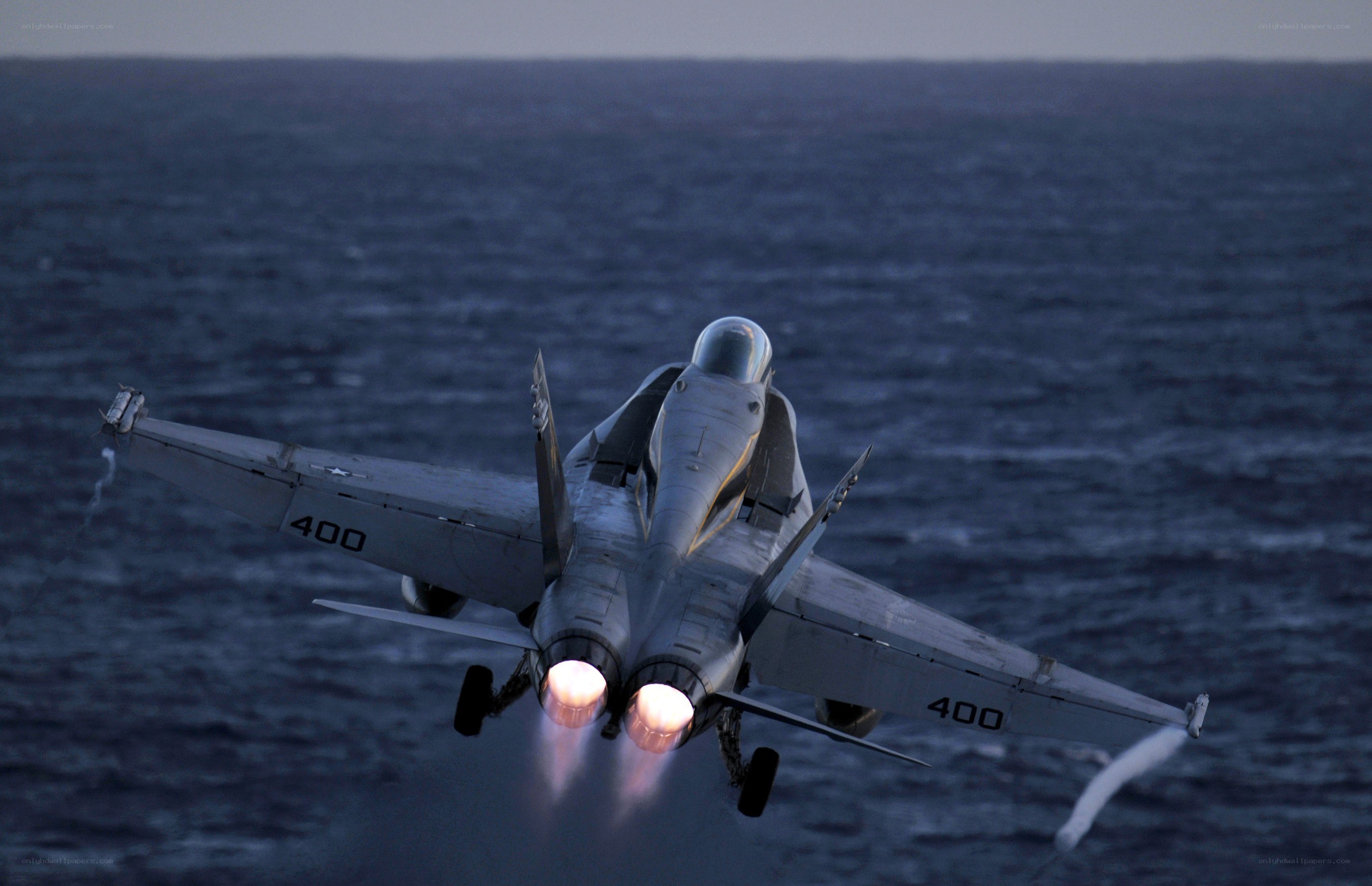 Jet taking off over the ocean