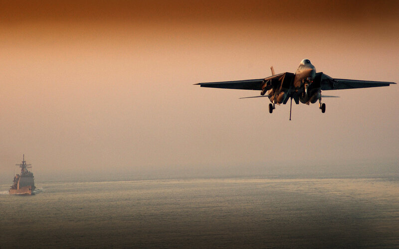 Jet taking off over the ocean