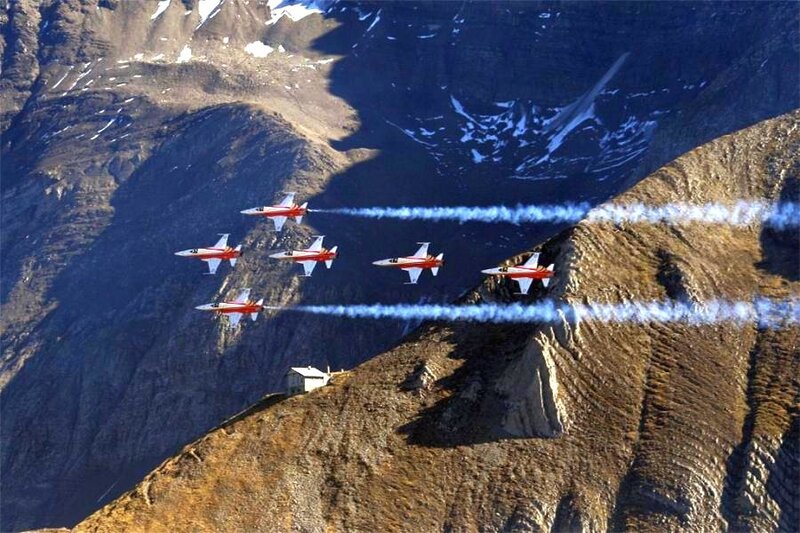 Jet team flying over mountains