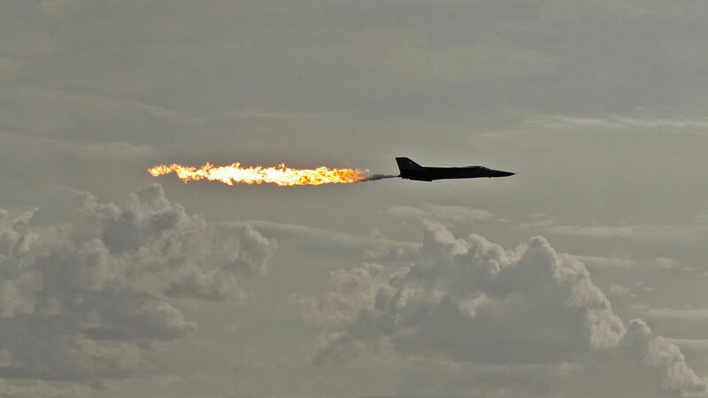 Jet with afterburner in flight