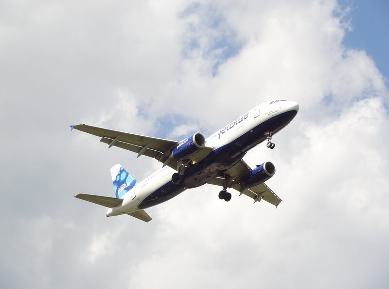 JetBlue Airplane in Flight — White
