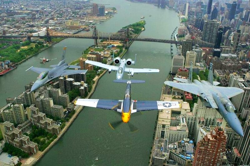 Jets flying over a city