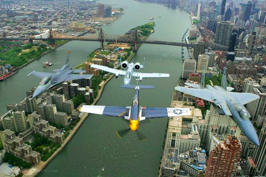 Jets flying over a city