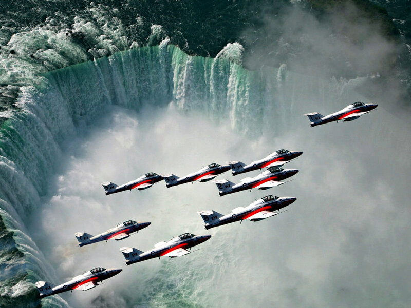 Jets Flying over Waterfall
