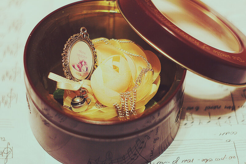 Jewelry in a Tin Box