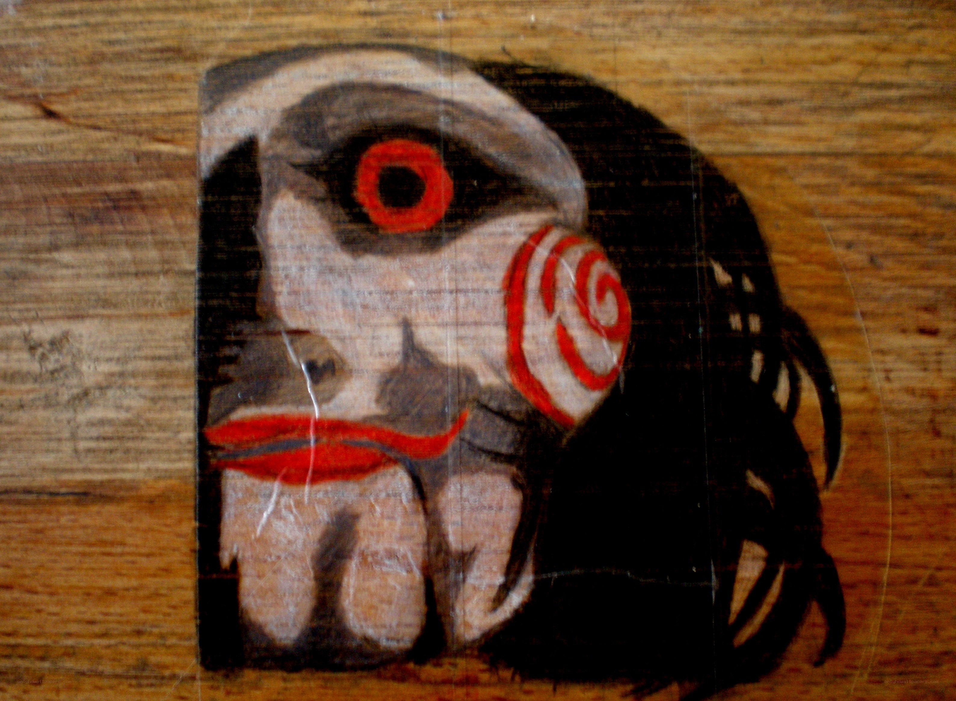 Jigsaw mask drawing on wood