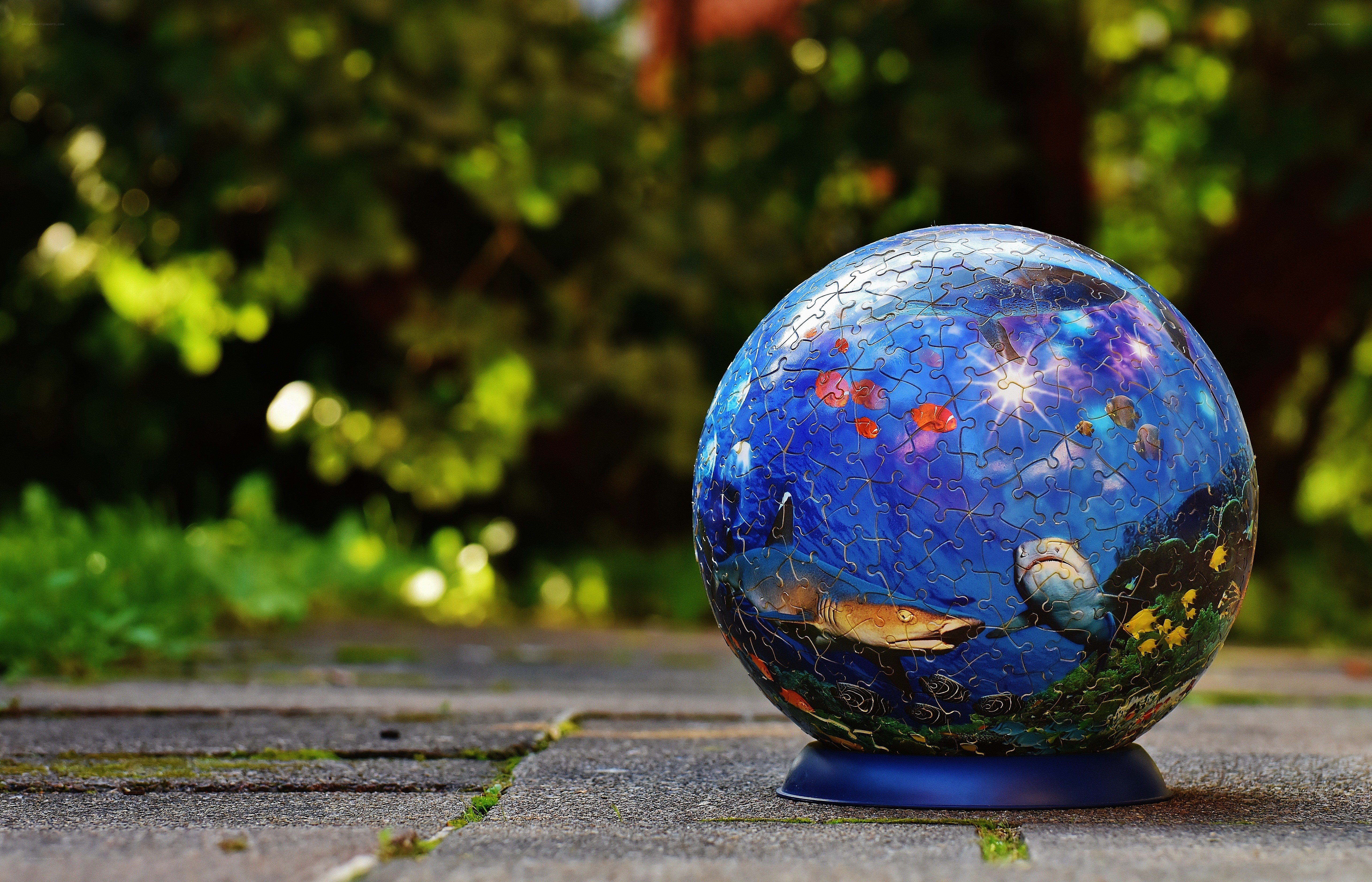 Jigsaw puzzle sphere with ocean scene