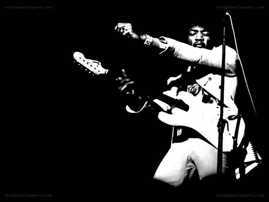 Jimi Hendrix performing on stage